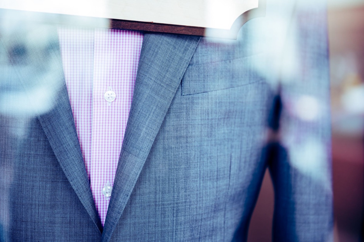 Close-up of premium suit fabric representing a custom-fit solution.